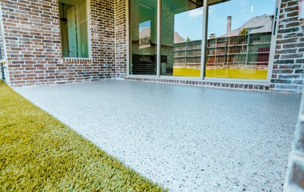 outdoor area is not a good place for epoxy floors. for outdoor use polyaspartic floor coating