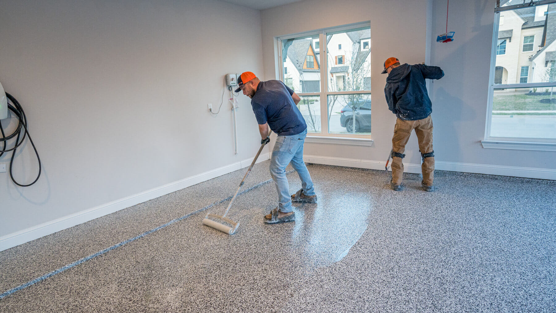 In-house trained crews apply our two coats of polyaspartic floor coating in one day
