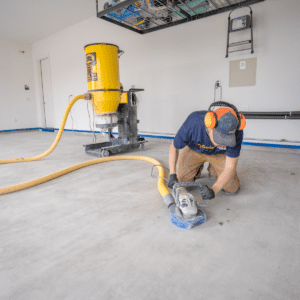 Diamond grinding concrete floor before applying our polyaspartic coating