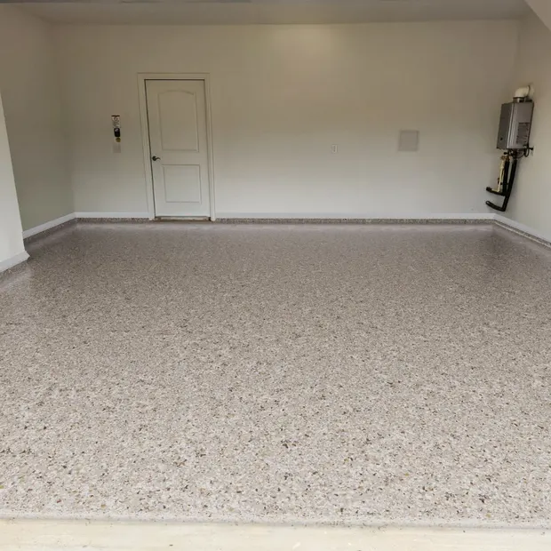 Creekbed tan and gray full flake polyaspartic garage floor coating by MyGarageFloors.com